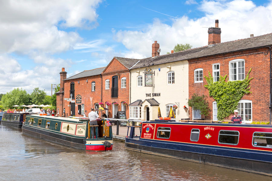 Narrowboats at Fradley Junction on the Trent and Mersey Canal, Staffordshire, England, UK
